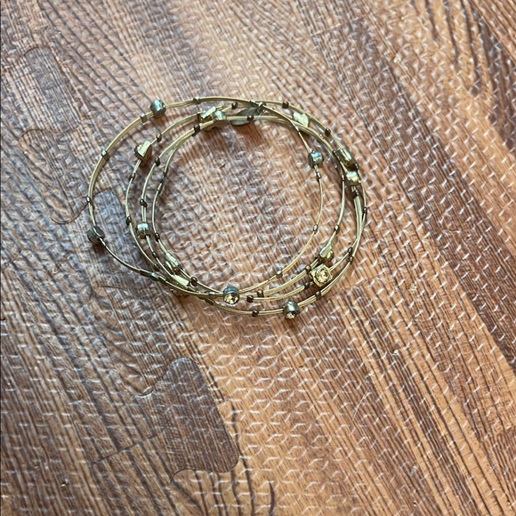 Elegant Gold Bracelet with Silver Accents - Picture 1 of 2